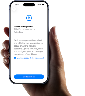 Right hand holding iPhone with screen displaying copy explaining what Device Management is with option to enrol