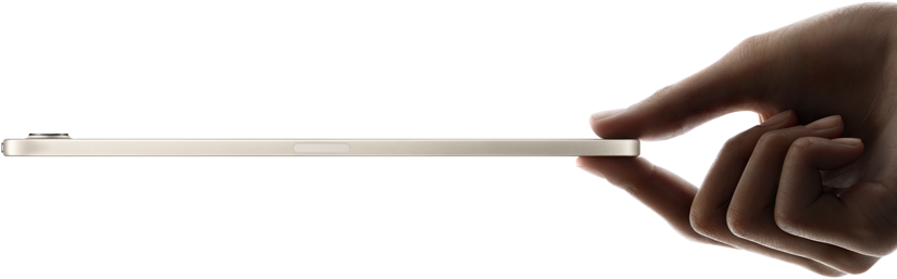 iPad mini, held in hand, side view, thin and lightweight design