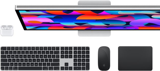 Collection of accessories and device including AirPods, Magic Keyboard with Touch ID, Magic Mouse, Magic Trackpad, Studio Display