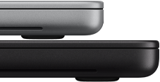 14-inch MacBook Pro with PROLED XDR Display, silver colour, stacked on top of 16-inch model, space black colour, showing size difference