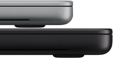 14-inch MacBook Pro with PROLED XDR Display, silver colour, stacked on top of 16-inch model, space black colour, showing size difference